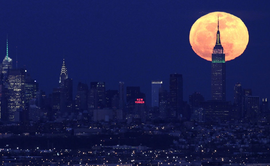 New York skyline with the supermoon in the background. AP New York skyline with the supermoon in the background. AP