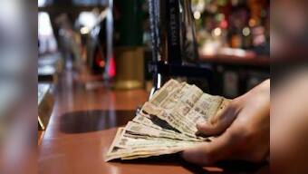 Rupee to hit 56 in a month,govt needs to deliver on fiscal front: experts