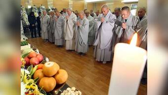 Caught raising hell, South Korean monks quit 