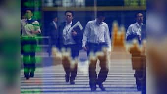 Asian indices tumble; Nifty futures too edge down