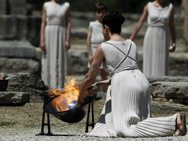 Olympic flame lit in ancient Olympia Olympic flame lit in ancient Olympia