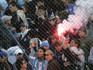 Racing Club players threatened by fans at gun-point Racing Club players threatened by fans at gun-point