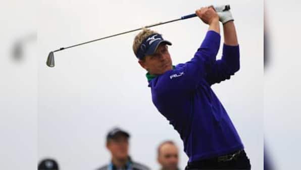 Donald retains PGA title at Wentworth, back at No. 1