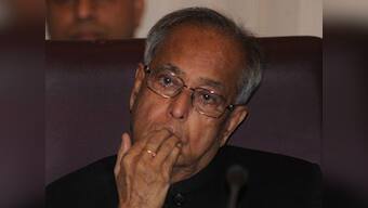 Pranab 'walks' the talk on presidency: Is it a hint to Sonia?
