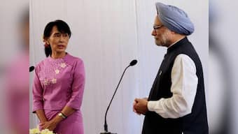 For Suu Kyi, one small step abroad - and a giant leap of faith