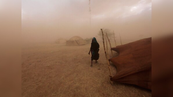 Dust storm brings mercury down in Delhi