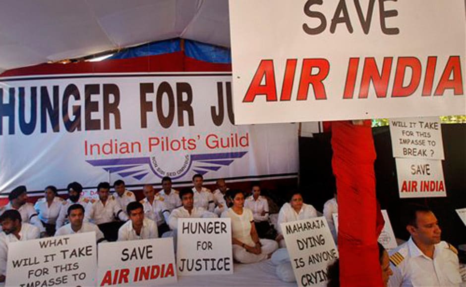 Air India pilots who have been on strike since 7 May and pledging their allegiance to the Indian Pilots Guild participate in a hunger strike against Air India's management in Mumbai. AP Air India pilots who have been on strike since 7 May and pledging their allegiance to the Indian Pilots Guild participate in a hunger strike against Air India's management in Mumbai. AP
