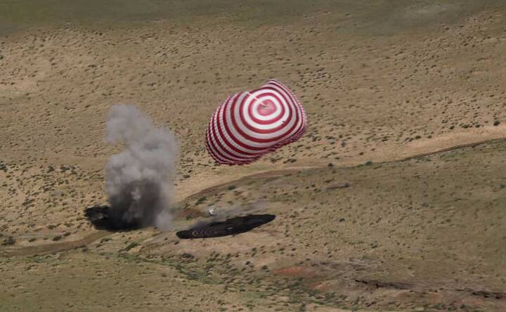 Images: China's first manned space mission returns to earth safely