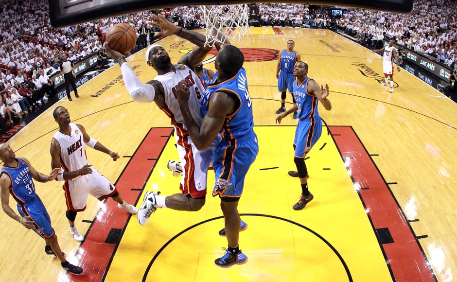 LeBron James #6 of the Miami Heat drives for a shot attemptm in the second half against Derek Fisher #37 of the Oklahoma City Thunder in Game Five of the 2012 NBA Finals on June 21, 2012 at American Airlines Arena in Miami, Florida. Getty Images LeBron James #6 of the Miami Heat drives for a shot attemptm in the second half against Derek Fisher #37 of the Oklahoma City Thunder in Game Five of the 2012 NBA Finals on June 21, 2012 at American Airlines Arena in Miami, Florida. Getty Images