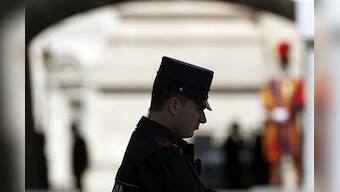 Pope's tiny police force hunts the enemy within