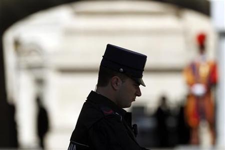 Pope's tiny police force hunts the enemy within Pope's tiny police force hunts the enemy within