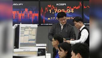 Asian shares rise as Spain seeks bail out