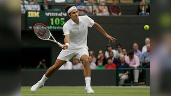 Federer through, bad boy Nalbandian loses in Wimbledon