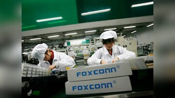 Apple supplier Foxconn breaking China's labour laws: report 