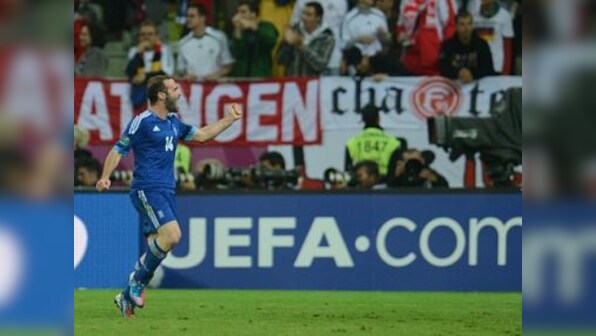 Greeks cheer despite defeat in Euro 2012
