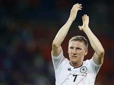 Germany's Bastian Schweinsteiger celebrates their victory at the end of their Group B Euro 2012 soccer match against Netherlands. Reuters