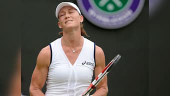Stosur crashes out of Wimbledon after loss to Rus