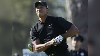 US Open: Woods in joint lead, McIlroy's title defence collapses