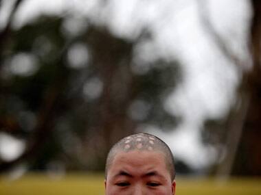 Muslim woman TV anchor loses job for charity haircut