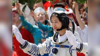 China sends first woman into space