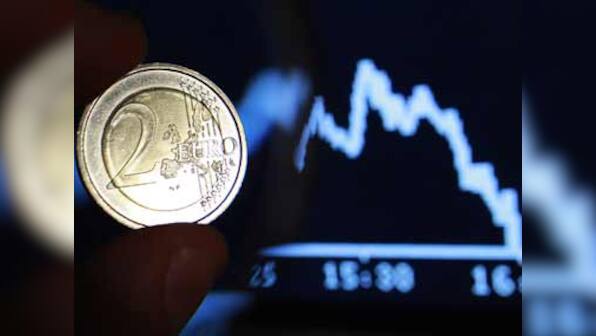 Moody's cuts German banks ratings on euro crisis