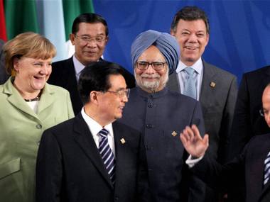 Manmohan pledges $10 bn as 5 MT of food rots back home Manmohan pledges $10 bn as 5 MT of food rots back home