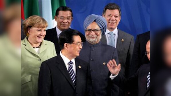 Manmohan pledges $10 bn as 5 MT of food rots back home