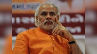 Modi takes on PM, confident of sweeping Guj 2012 polls