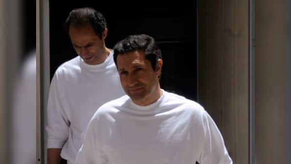 Egypt court acquits Mubarak's sons, his last PM in corruption case