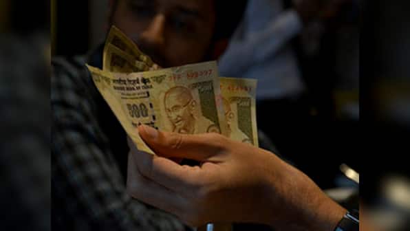 Rupee falls past 56.52/dollar to hit new life low