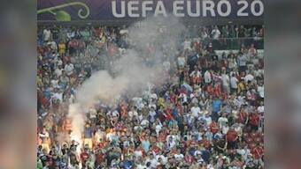 Russia get third UEFA fine for fans' antics at Euro 2012