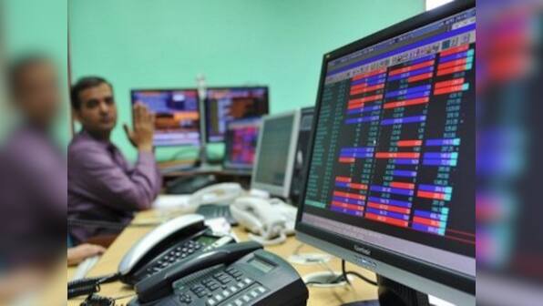 Sensex, Nifty close flat; cement stocks edge higher