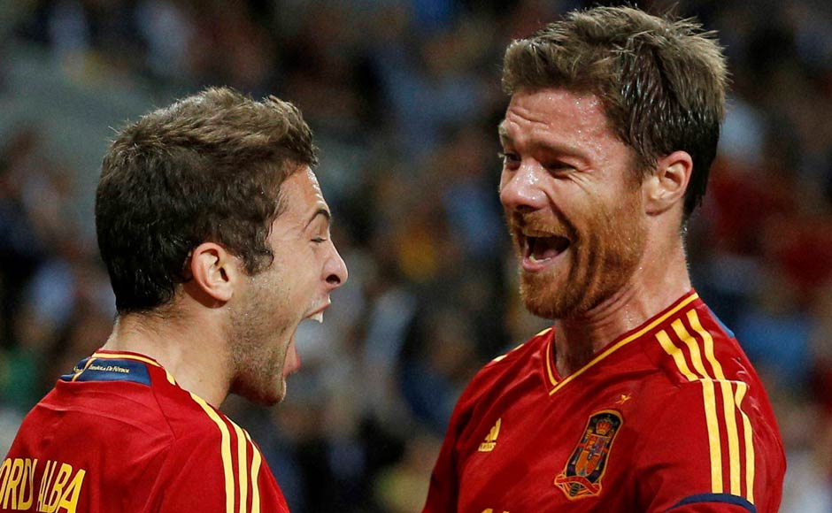 Spain's Jordi Alba, left, celebrates with his teammate Xabi Alonso after scoring his side's second goal. AP Spain's Jordi Alba, left, celebrates with his teammate Xabi Alonso after scoring his side's second goal. AP