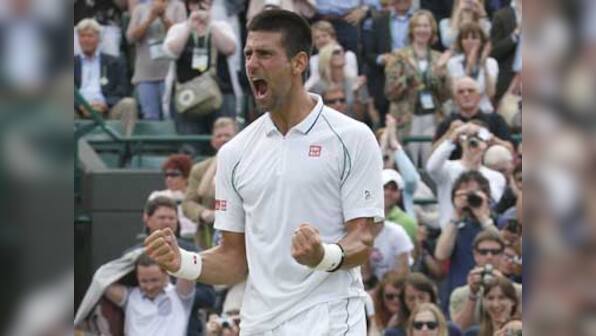 Federer to face Djokovic in Wimbledon semifinal