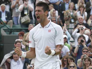 Federer to face Djokovic in Wimbledon semifinal Federer to face Djokovic in Wimbledon semifinal