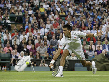 Wimbledon: Djokovic cruises, Federer wins despite back scare Wimbledon: Djokovic cruises, Federer wins despite back scare