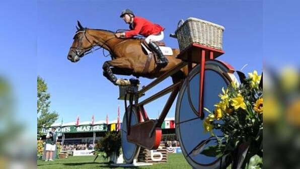 Showjumper Millar happy to be father figure