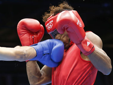 Boxing: Jai Bhagwan hammers Andrique to advance Boxing: Jai Bhagwan hammers Andrique to advance