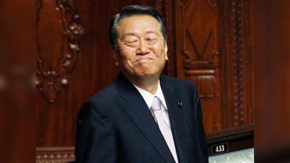 Dozens quit Japan's ruling party in blow to PM