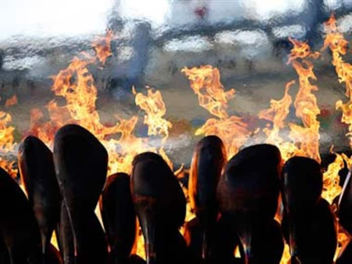 Olympic cauldron moved to ready stadium for athletic events Olympic cauldron moved to ready stadium for athletic events