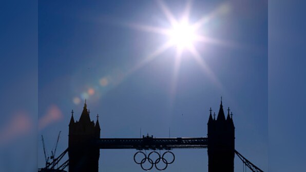 Man dives off Tower Bridge in Olympic taxi protest