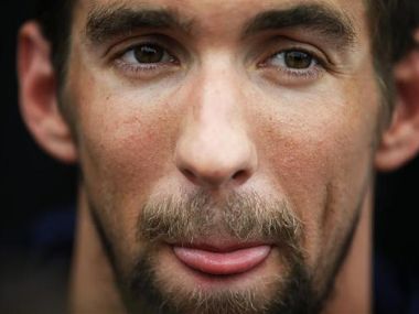 Olympics: Phelps' shaggy appearance hides ambitions Olympics: Phelps' shaggy appearance hides ambitions