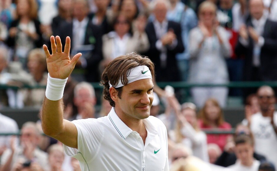 Roger Federer of Switzerland reacts after defeating Albert Ramos of Spain in their men's singles tennis match at the Wimbledon tennis championships in London June 25, 2012. Reuters Roger Federer of Switzerland reacts after defeating Albert Ramos of Spain in their men's singles tennis match at the Wimbledon tennis championships in London June 25, 2012. Reuters