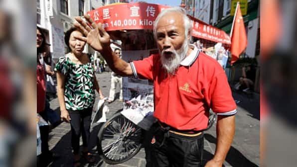 Man cycles from China to Olympics... talk about support