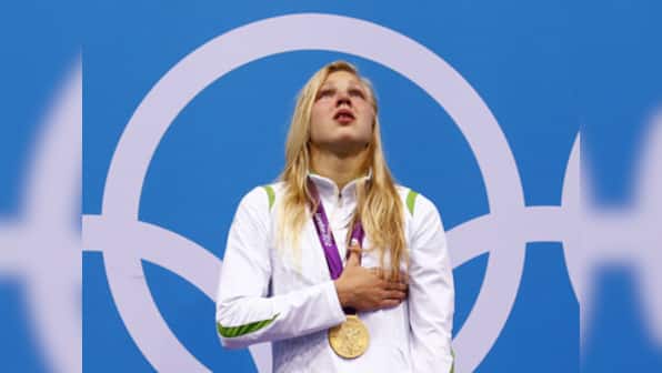 Lithuania's Meilutyte, aged 15, wins gold in 100m breaststroke