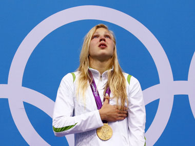 Lithuania's Meilutyte, aged 15, wins gold in 100m breaststroke Lithuania's Meilutyte, aged 15, wins gold in 100m breaststroke