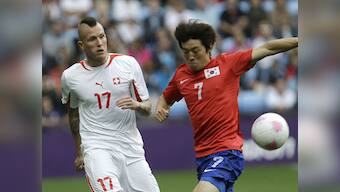 Swiss Olympic team expels footballer for racist tweet 