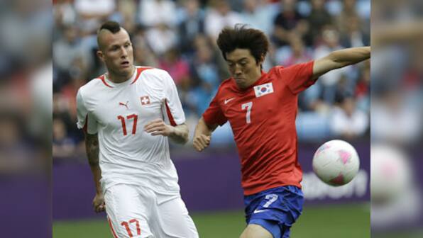 Swiss Olympic team expels footballer for racist tweet 