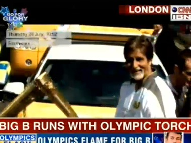 Amitabh Bachchan carries the Olympic torch Amitabh Bachchan carries the Olympic torch