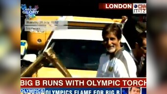 Amitabh Bachchan carries the Olympic torch